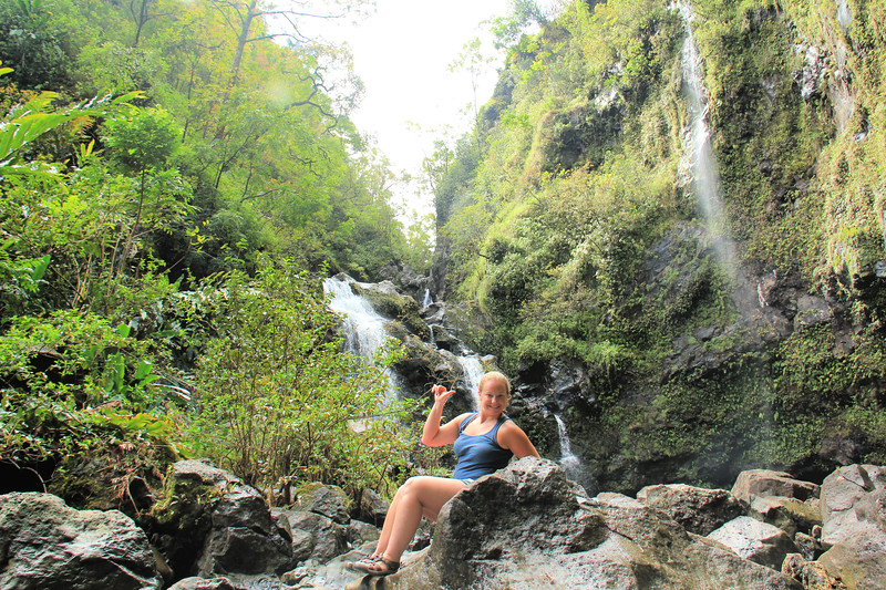 Lina Stock of 8 Wonders of the World Adventure Travel Blog at three bears waterfall on the road to Hana