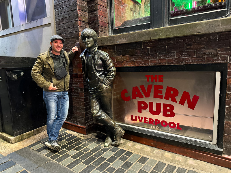 David Stock at the entrance to the Cavern Club with a Beetles statue
