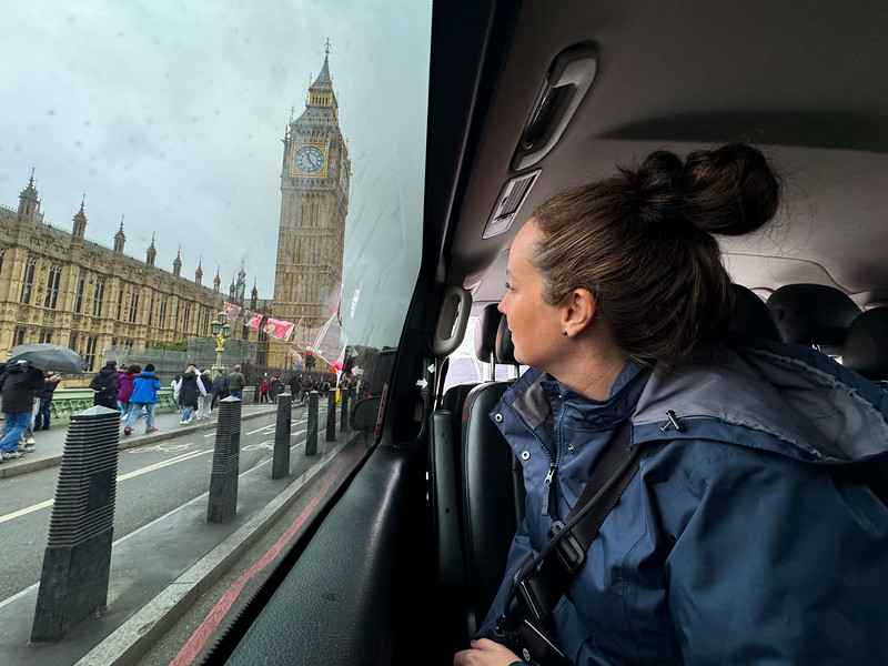 Lina Stock looking at Big Ben from a bus window in London, England