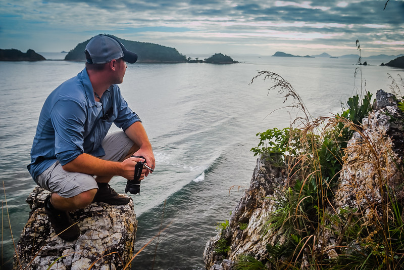David Stock Jr of 8 Wonders of the World Adventure Travel Blog looking out over Busuanga, Philippines