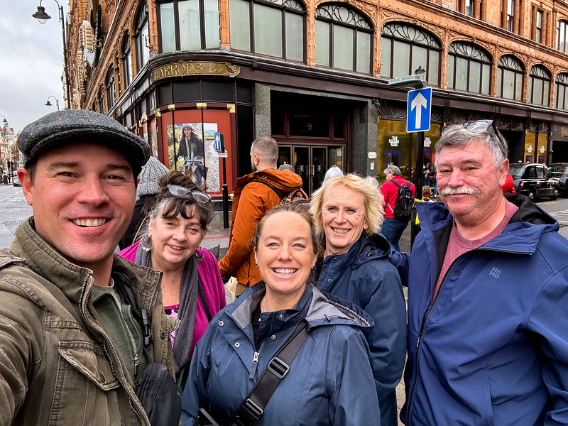 Group of travelers at Harrod's in London, England