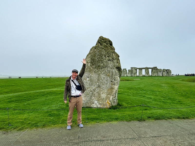 David Stock with stones at Stonehenge, England