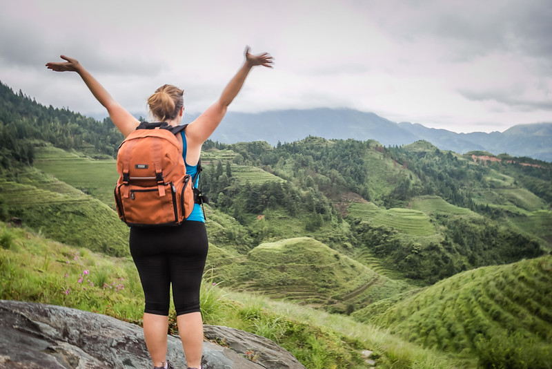 Lina Stock hiking in China - Best camera backpack for travel