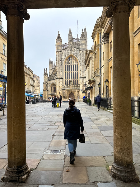 Lina Stock walking in the streets of Bath, England