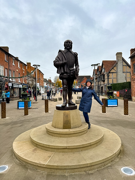 Lina Stock with William Shakespeare statue in Stratford-upon-Avon, England